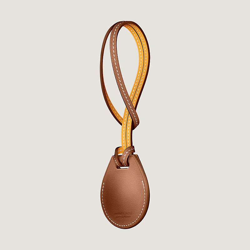 Apple AirTag Hermès bicolor bag charm | Hermès Mainland China